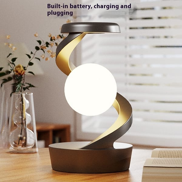 a9430f41-374f-46c6-acf0-fea6003a5365_trans.jpeg Rotating Moon Desk Lamp